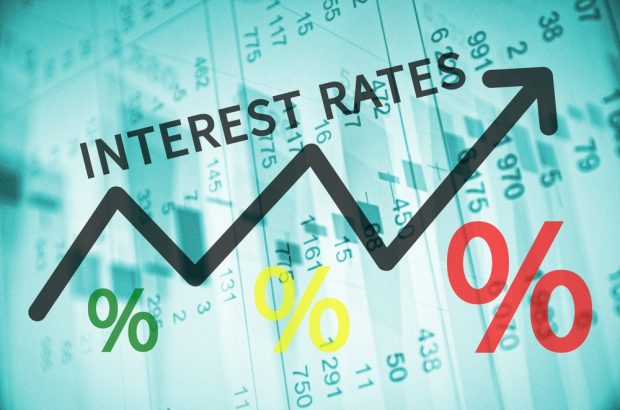 the words 'interest rate hike' over percentage graphics