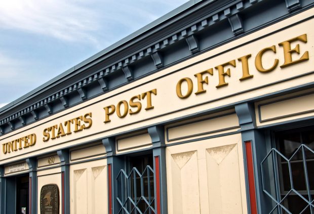 U.S. Post Office sign on a building