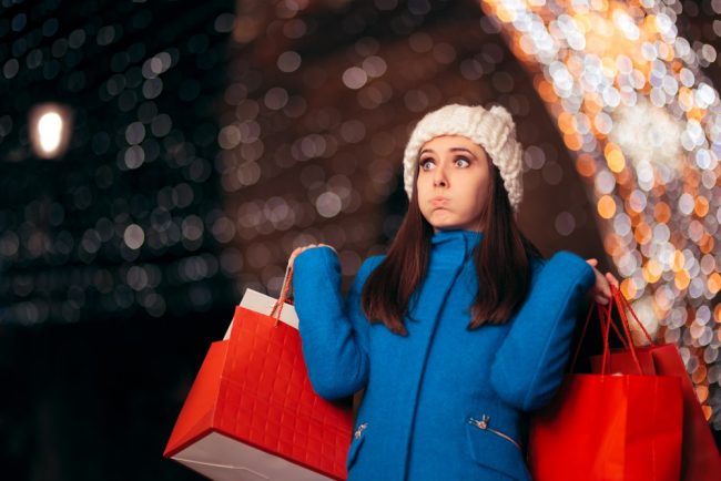 Woman stressed by holiday shopping