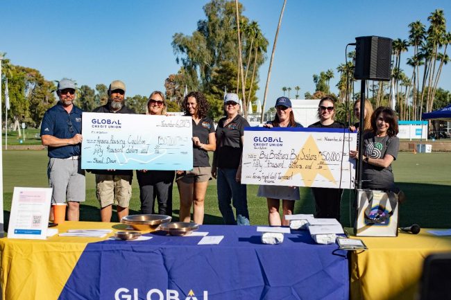 Global Credit Union Foundation volunteers present $50,000 to Big Brothers Big Sisters of Central Arizona and $50,000 to Arizona Housing Coalition
