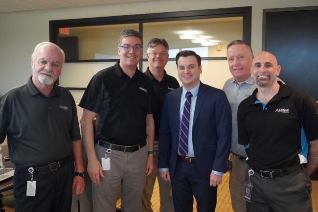 Hayden Hampton, third from right, meets with members of Addition Financial's executive team, including President/CEO Kevin Miller (second from left) and Vice President, Business Intelligence Jason Mizrahi (far right).