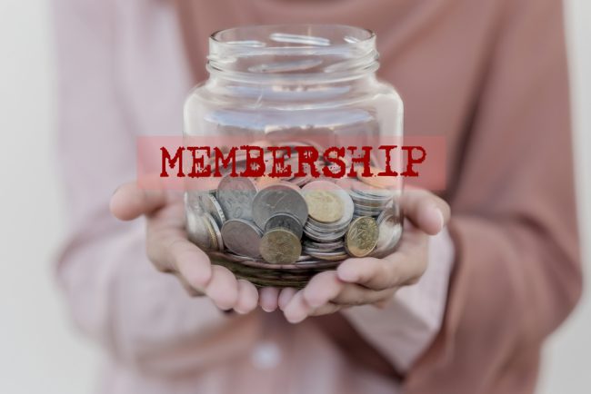 hands holding jar of coins with "membership" word overlay