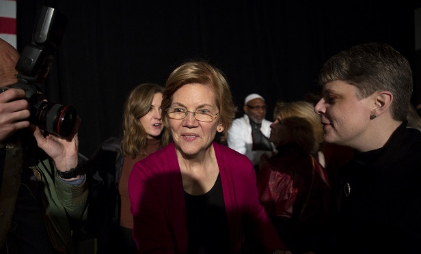 Senator Elizabeth Warren, a Democrat from Massachusetts, greets attendees during an organizing event in Des Moines, Iowa, U.S., on Saturday, Jan. 5, 2019. Warren took a major step last week toward an all-but-certain 2020 White House run, seeking to become the Democratic nominee to challenge President Donald Trump on a message of economic equality and fighting corruption. Photographer: Daniel Acker/Bloomberg