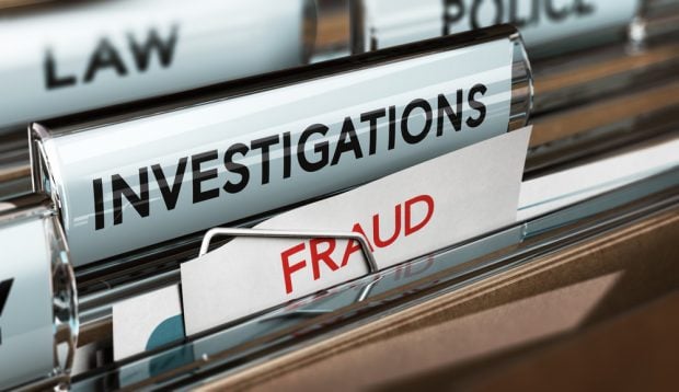 File marked "Fraud" and "Investigations"