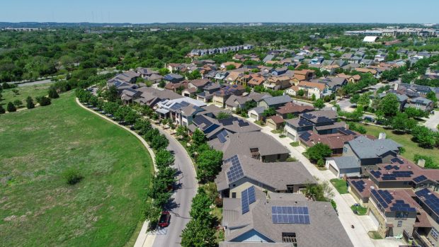 solar panels on suburban homes.