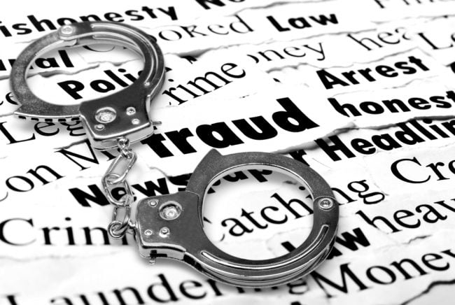 Handcuffs over fraud-related words