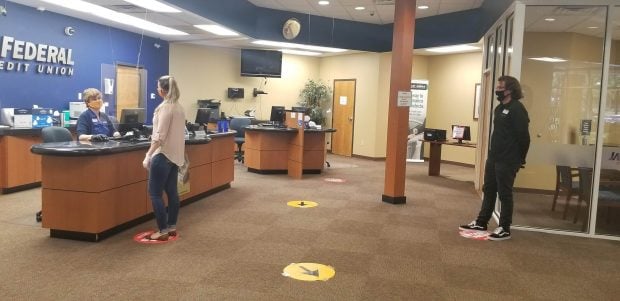 Social distancing inside the credit union branch.