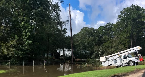 Crews work to restore power in Louisiana in the days after Hurricane Laura.