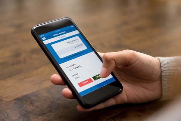 person using a mobile banking app