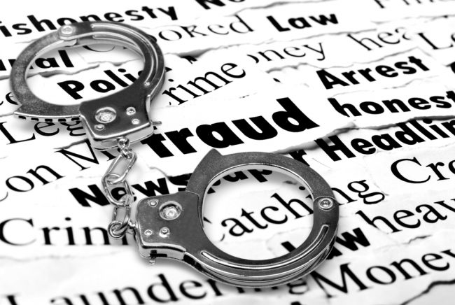 Handcuffs over fraud-related words