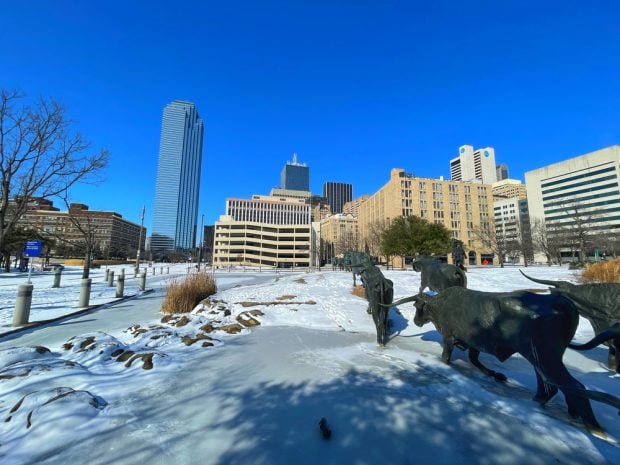 Ice and snow cover Dallas after first of five winter storms in a week.
