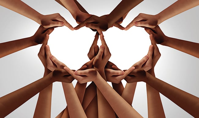 diverse hands forming two hearts