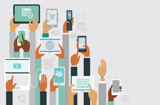 hands holding up digital devices for banking