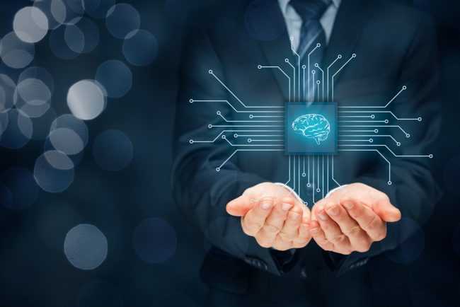 businessman holding brain/AI tech symbol in hands