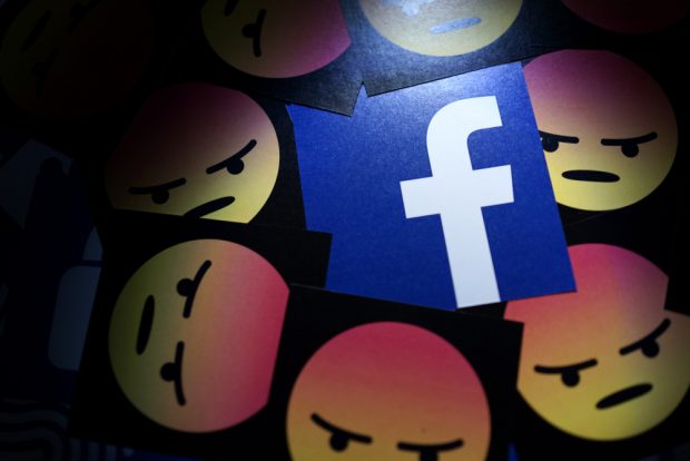 image of angry face emojis with the facebook logo