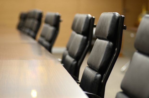 Empty chairs in boardroom