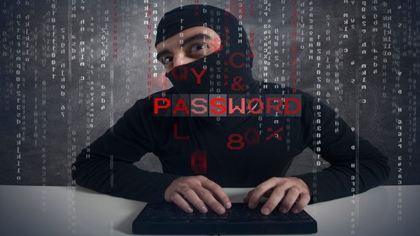 hacker typing on computer with "password" text