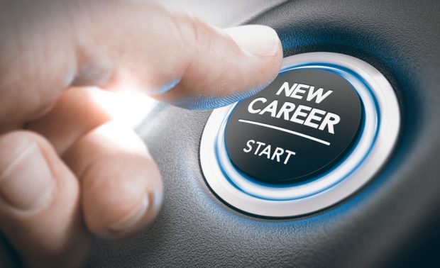 finger pushing new career start button