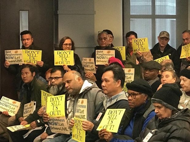 Taxi drivers attend the NCUA board meeting on Thursday, Jan. 23, 2020. 