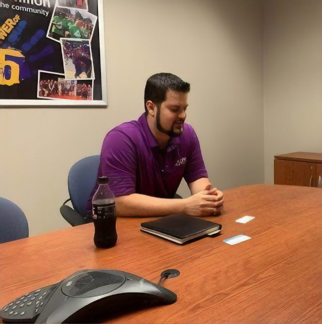 Anthony Padron in a GTE Financial conference room.