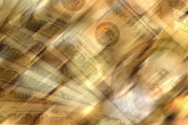 photo of blurry $100 bills