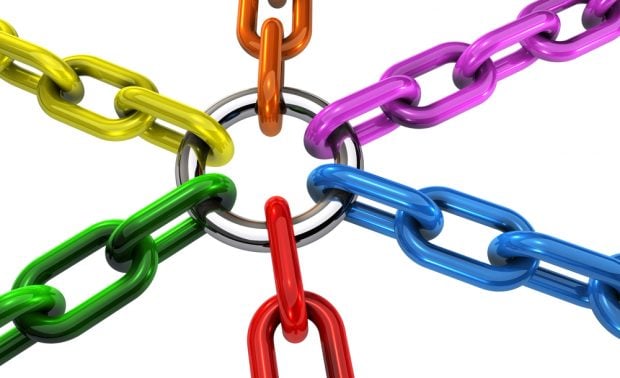 Diversity and Inclusion represented by different colored chains linked together.