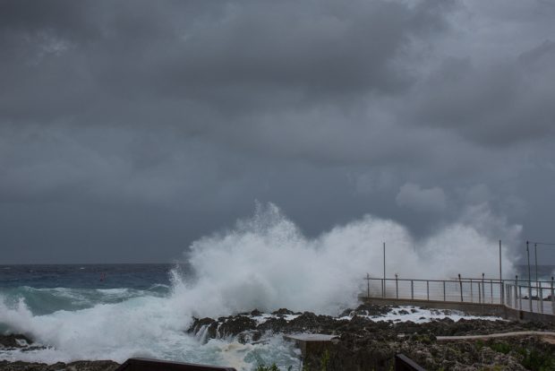 What was Tropical Storm Laura last week as it passed over Grand Cayman.