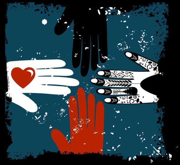 art concept of hands reaching in showing love and caring for different cultures
