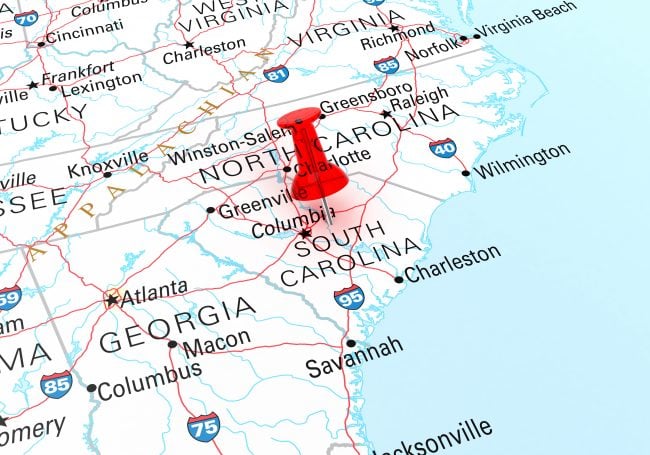 Red Thumbtack Over South Carolina State USA Map. 3D rendering