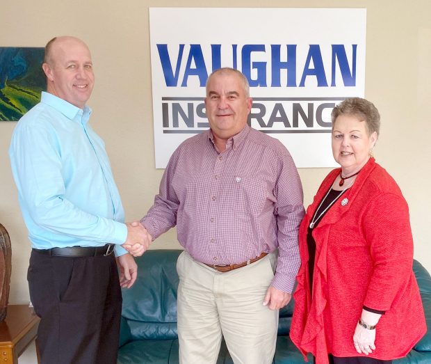 From left to right, Scott Shults, Randall Vaughan center and his agent Charleen Turner to the far right.