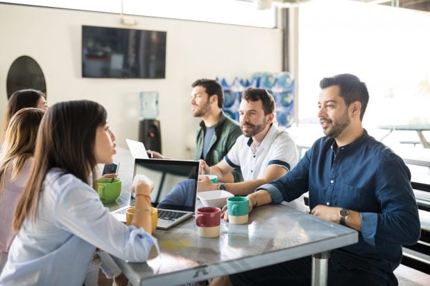 Startup team at office cafeteria