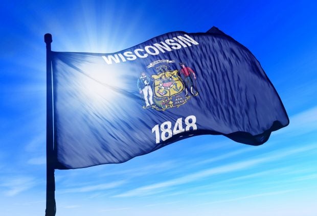 Wisconsin state flag. (Source: AdobeStock)