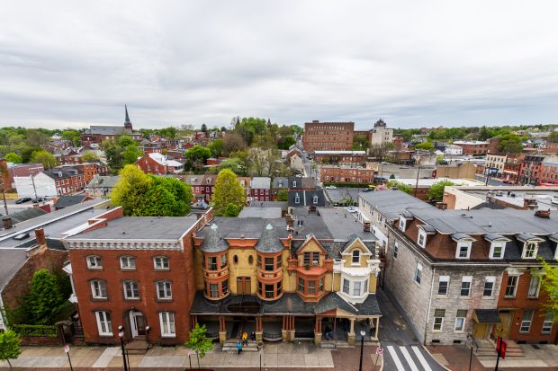 Aerial of historic downtown Lancaster, Pennsylvania with blooming trees