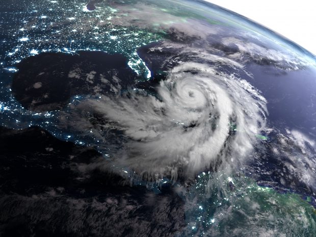 Satellite view of night over America with masive hurricane in Caribbean. 3D illustration. Elements of this image furnished by NASA