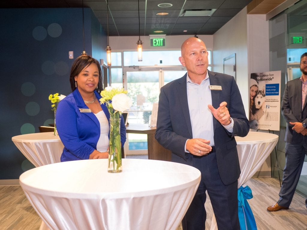 Partin (R) with Sharonview Regional Assistant Vice President Temeka Long at the credit union's Steele Creek branch grand opening event