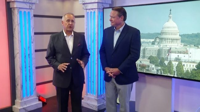 Still shot of Jim Nussle and Dan Berger making a video announcement of the merger