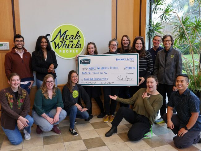 OnPoint CU presents a check to Meals on Wheels People in honor of Giving Tuesday