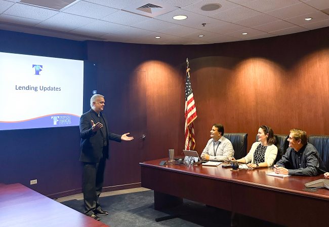 Padron presents to his senior leadership team at a recent meeting