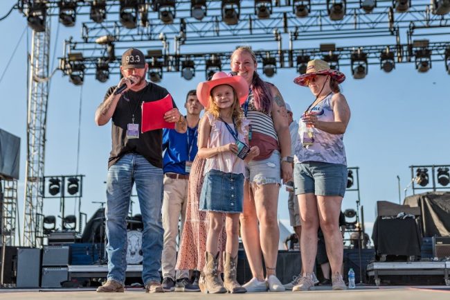 A Make-A-Wish child and her family are recognized during a recent Make-A-Wish Utah event