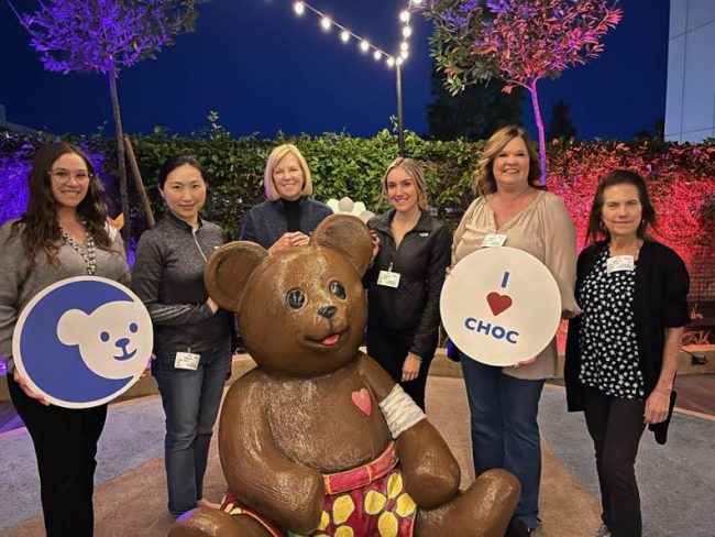 SchoolsFirst employees participate in a Thanksgiving dinner delivery in November 2023 at Children's Health of Orange County in Orange, Calif., one of the many activities organized by the credit union to raise funds for children's hospitals