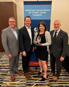 L-R: AACUL Chair and CrossState Credit Union Association President/CEO Patrick Conway, GoWest Credit Union Association President/CEO Troy Stang, Leavitt and AACUL President Brad Mille