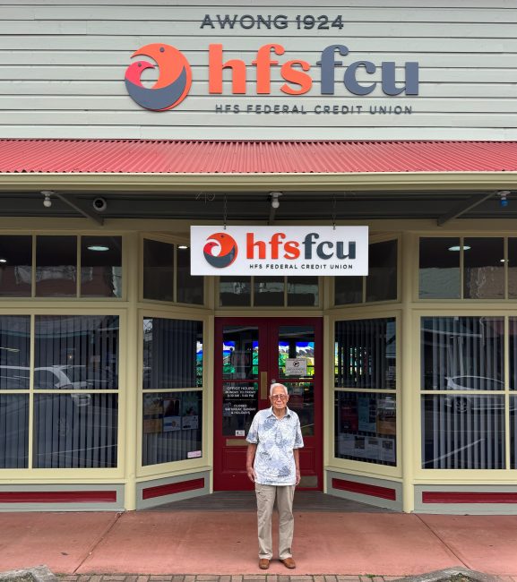 Gilbert Awong is pictured in front of the HFS FCU branch that honors his family store