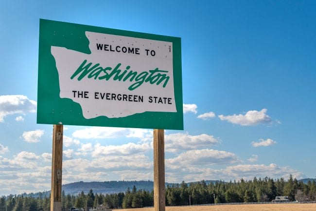 A roadside welcome to Washington State, the Evergreen State.