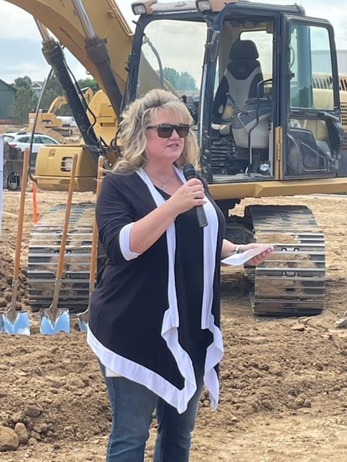 Amanda Kutzler speaks at the groundbreaking for Premier Members Credit Union's Erie, Colo., branch on Feb. 10, 2023.