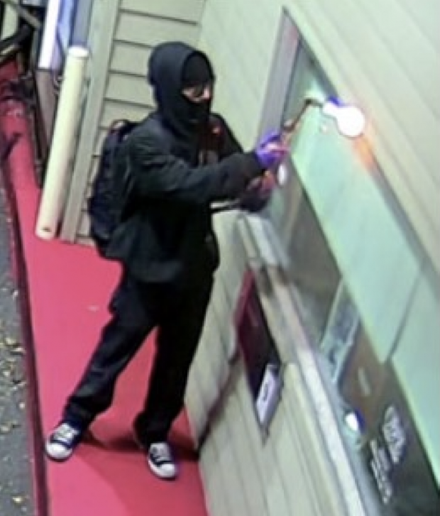 Security image of the suspect using a blow torch provided as evidence.