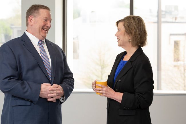 Paul Krus (left) with Mindy Seagraves, assistant vice president, manager client services for TFCU Financial Advisors, in May 2024