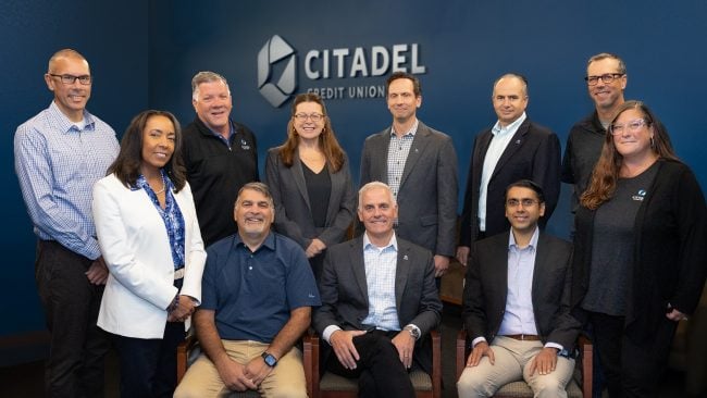 From left to right: Chief Risk Officer Chris Palumbo, Chief Wealth Management Officer Sheri Perkins, Chief Information Officer Brian Berry, Chief Human Resources Officer Mike Aileo (seated), Chief Retail Officer Lucia 