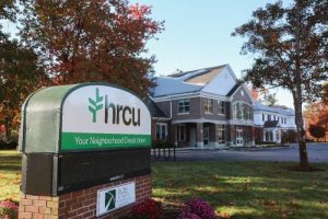 Sign reflecting HRCU's new logo and tagline outside its headquarters in Rochester, N.H. 